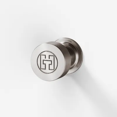 Hassel&Teudt HKN01L - Møbelhåndtak med H&T-logo, PVD-børstet stål